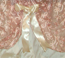 close up of bow on skirt